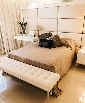 Vintage-style yellow armchair in a minimalist room